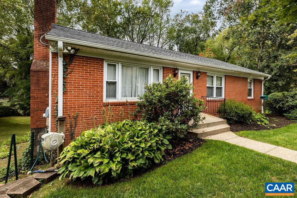 1905 Swanson Drive Charlottesville, VA 22901 - Photo 3 of 37 a front view of a house with a garden