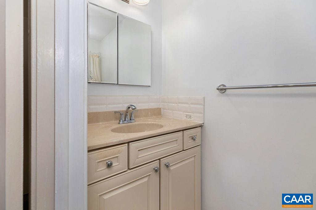 1905 Swanson Drive Charlottesville, VA 22901 - Photo 31 of 37 a bathroom with a sink and vanity