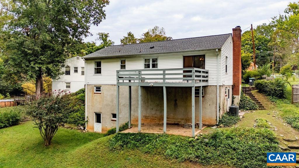 1905 Swanson Drive Charlottesville, VA 22901 - Photo 5 of 37 a view of a house with a sink and garden with plants