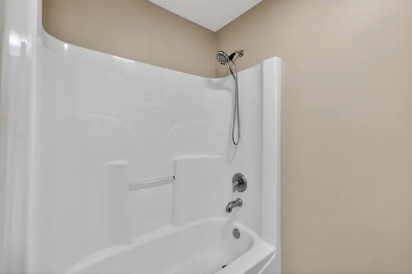 a bathroom with a bathtub