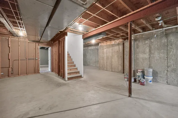 a view of a room with wooden walls
