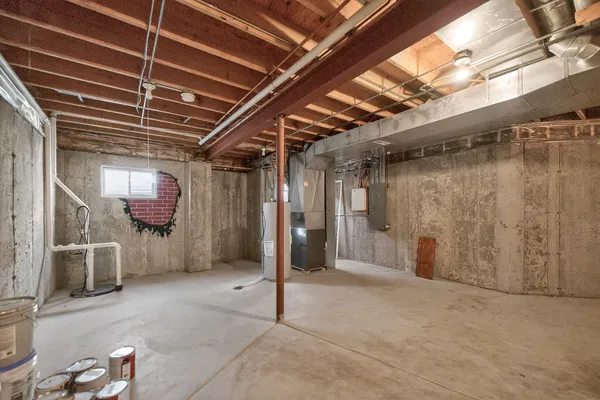 a view of an empty room with a fireplace