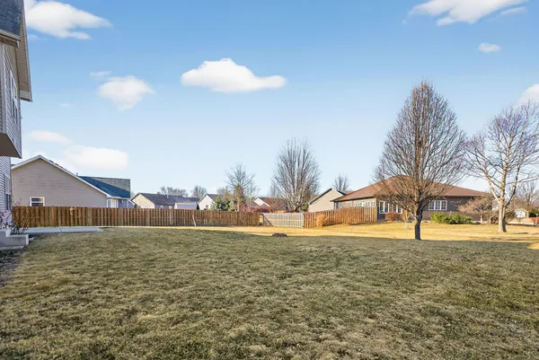 a view of yard with trees