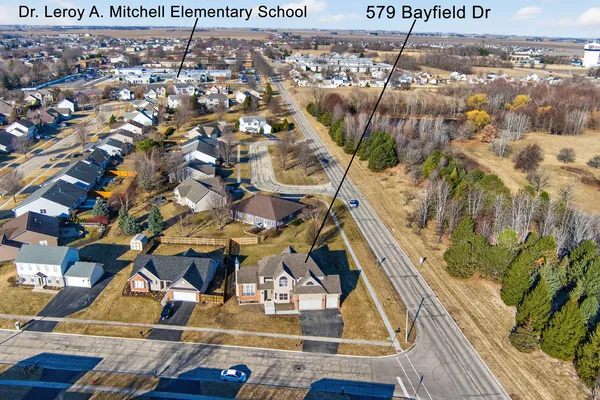 a view of a terrace with seating space and city view
