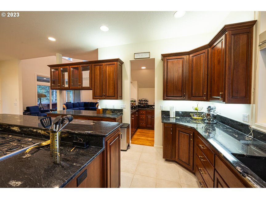 3338 Lakeside Drive Eugene, OR 97401 - Photo 17 of 45 a kitchen with a sink stove and cabinets