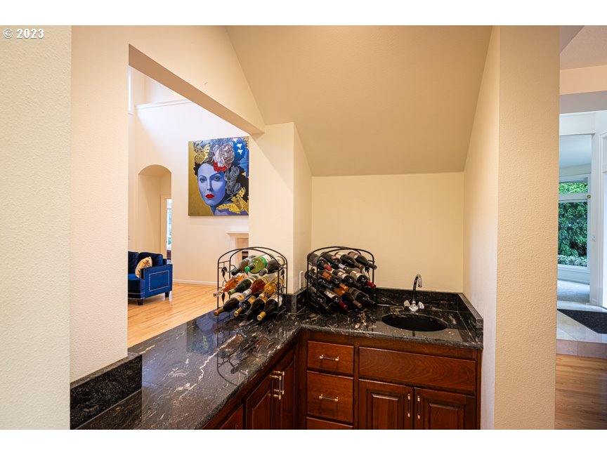 3338 Lakeside Drive Eugene, OR 97401 - Photo 18 of 45 a bathroom with a sink a mirror and next to a window