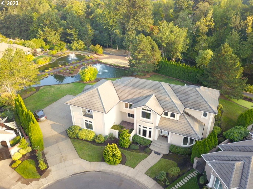 3338 Lakeside Drive Eugene, OR 97401 - Photo 2 of 45 an aerial view of a house with a yard and lake view