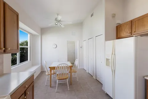 a view of a hallway with furniture and front door