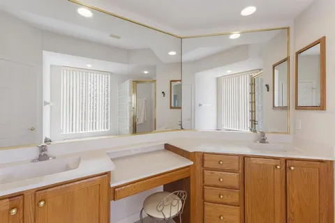 a bathroom with a bathtub and shower