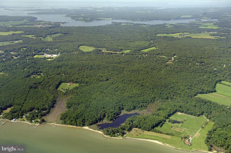 3 Notch Road Lexington Park, MD 20653 - Photo 4 of 5 a view of a lake with a mountain