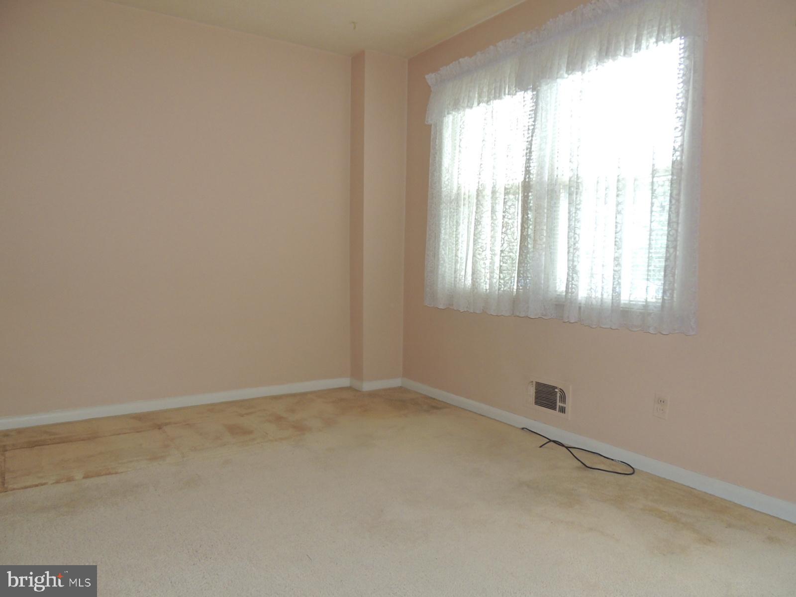 2215 Graythorn Road Baltimore, MD 21220 - Photo 2 of 27 LARGE LIVING ROOM WITH NATURAL SUNLIGHT