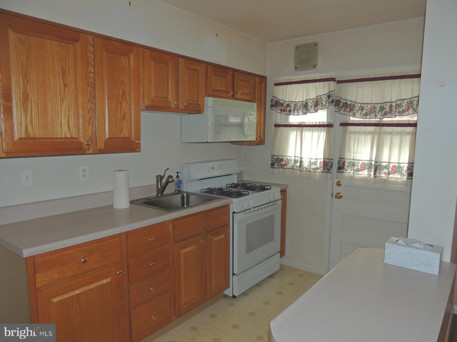 2215 Graythorn Road Baltimore, MD 21220 - Photo 6 of 27 NICELY UPATED KITCHEN WITH BREAKFAST BAR