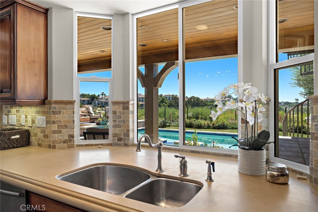 5 Via Monarca Street Dana Point, CA 92629 - Photo 11 of 57 a kitchen with a sink and a large window