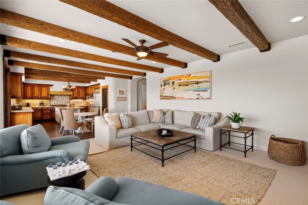 5 Via Monarca Street Dana Point, CA 92629 - Photo 13 of 57 a living room with furniture and a large window