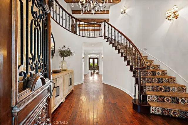 a view of a patio with lawn chairs