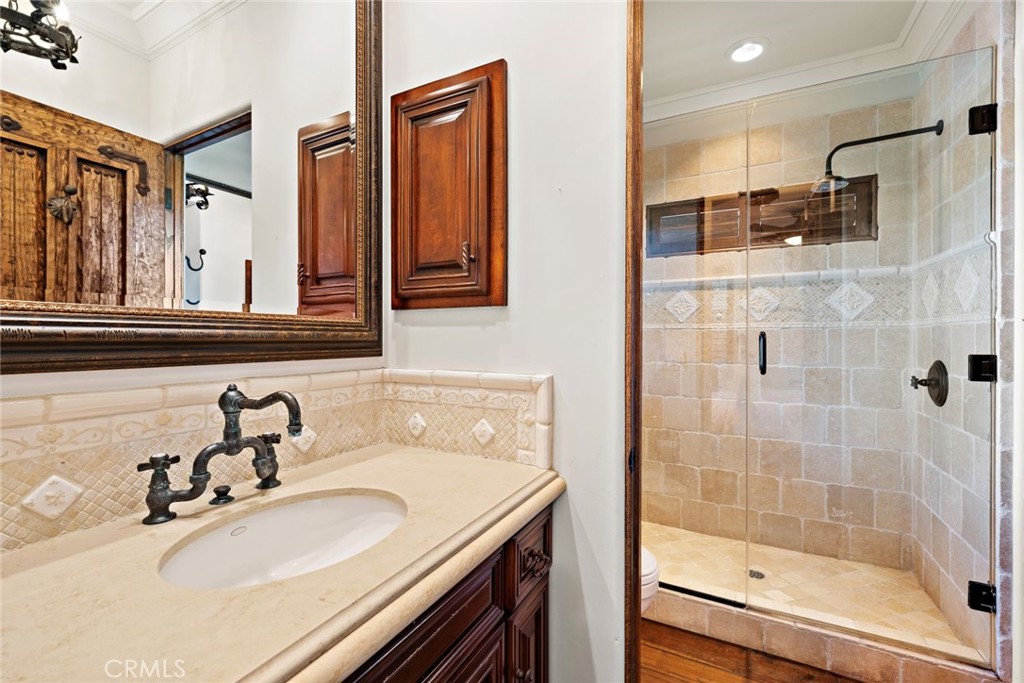 5 Via Monarca Street Dana Point, CA 92629 - Photo 31 of 57 a bathroom with a sink shower and a mirror