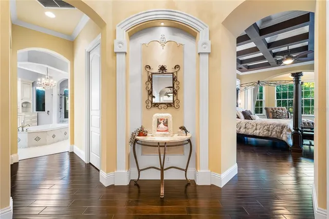 a bedroom with a bed and a table