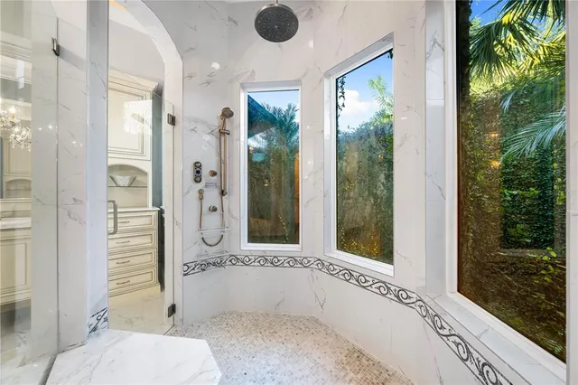 an aerial view of a house with a garden and plants