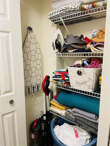 a room with storage and utility