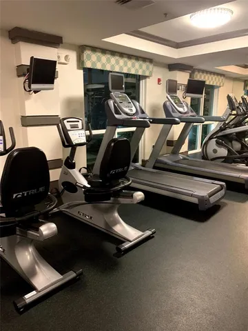 a gym room with gym equipment