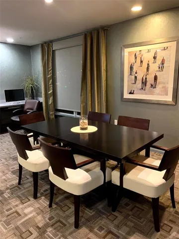 a view of a livingroom with a staircase