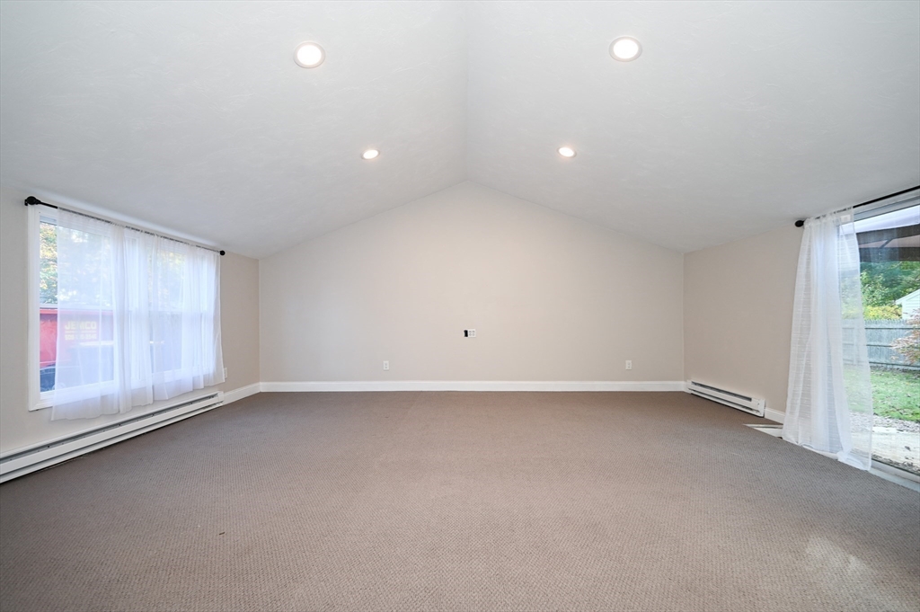 1 Linda Road Sharon, MA 02067 - Photo 11 of 25 an empty room with a empty space and windows