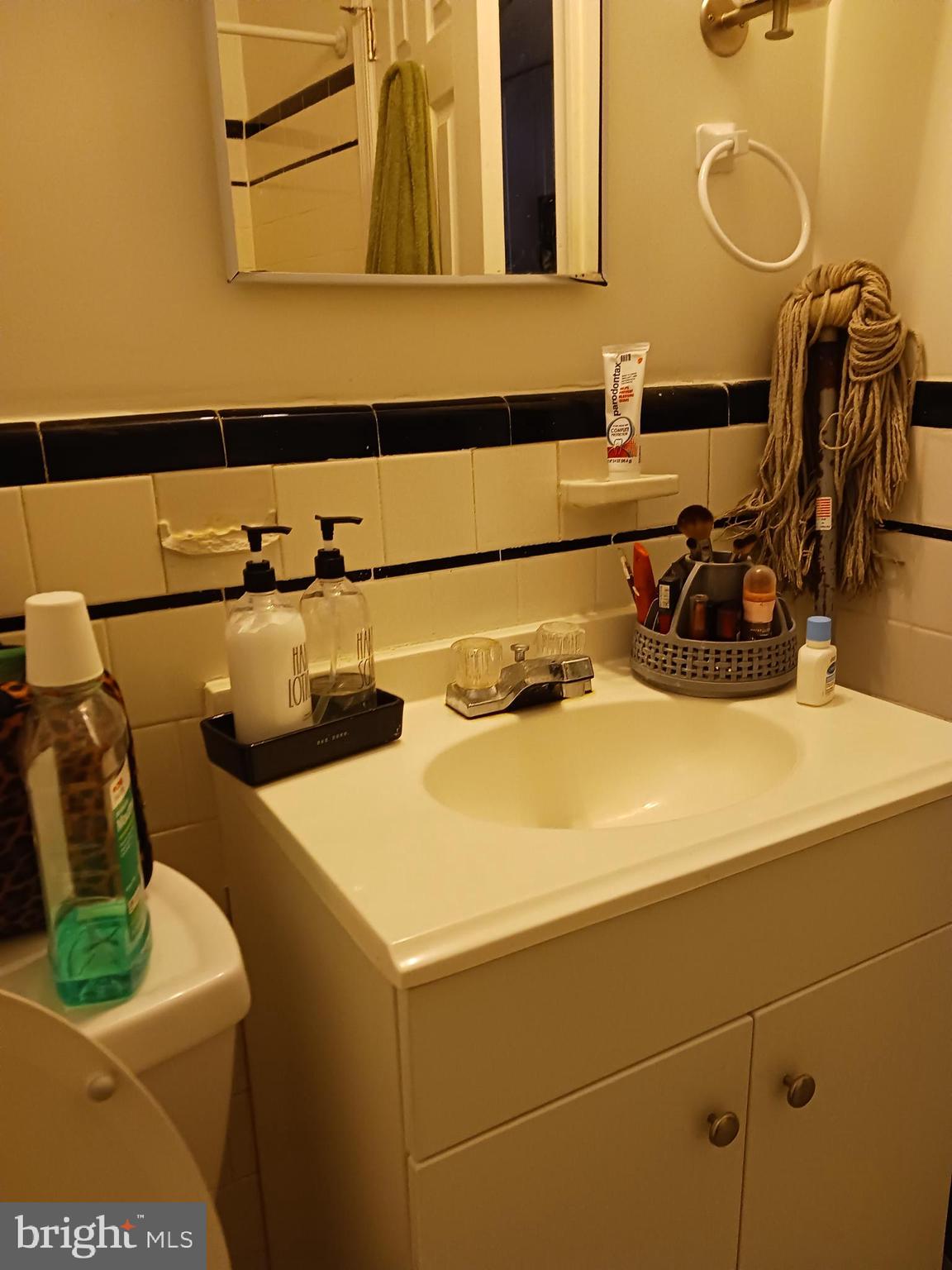 1912 M Street Northeast Washington, DC 20002 - Photo 9 of 12 a close view of sink and tap