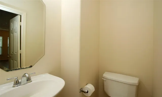 a bathroom with a sink and a toilet