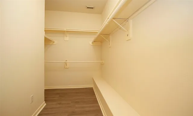 a bathroom with a glass door