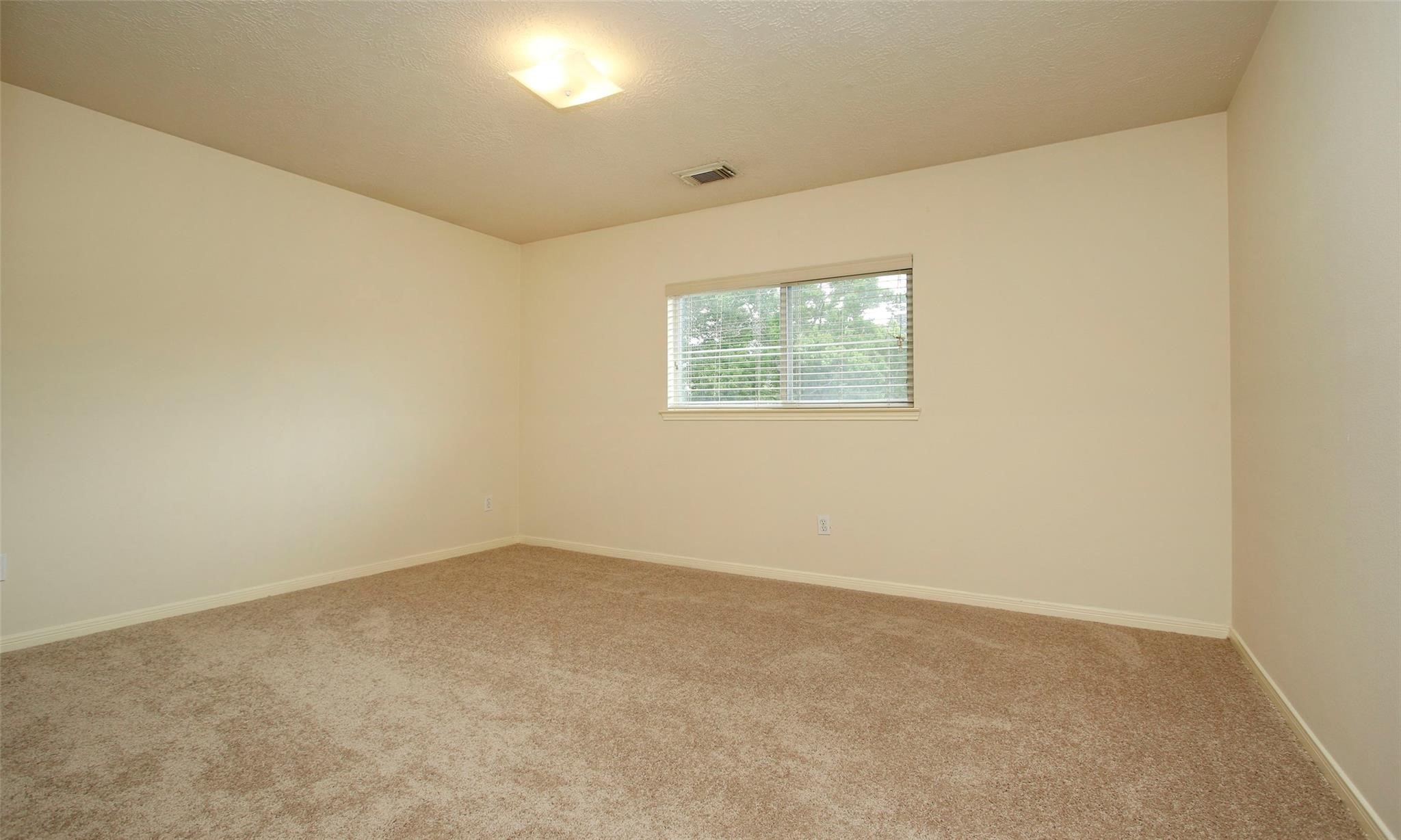 20506 Spring Lilac Lane Spring, TX 77388 - Photo 24 of 33 an empty room with windows
