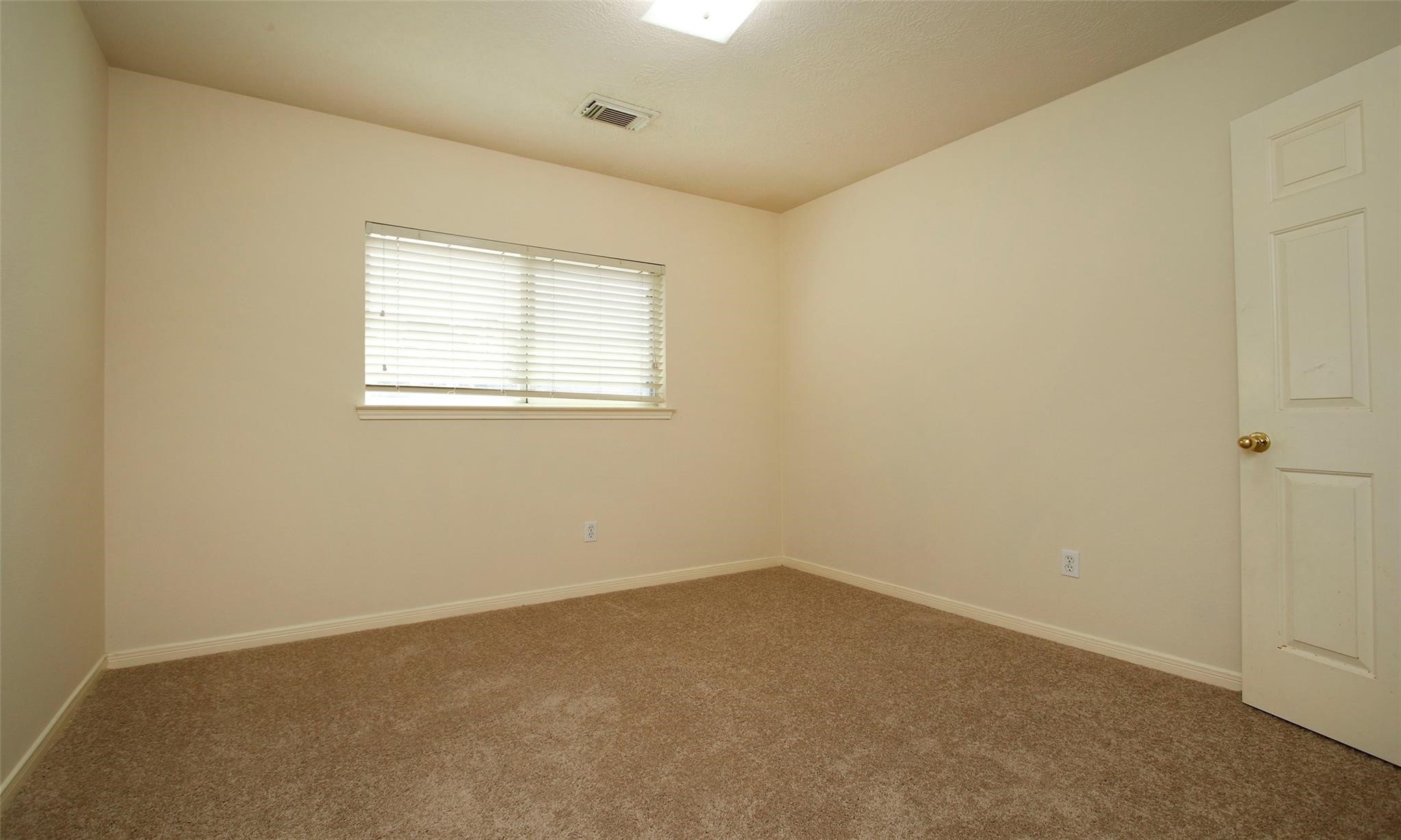 20506 Spring Lilac Lane Spring, TX 77388 - Photo 26 of 33 an empty room with a window