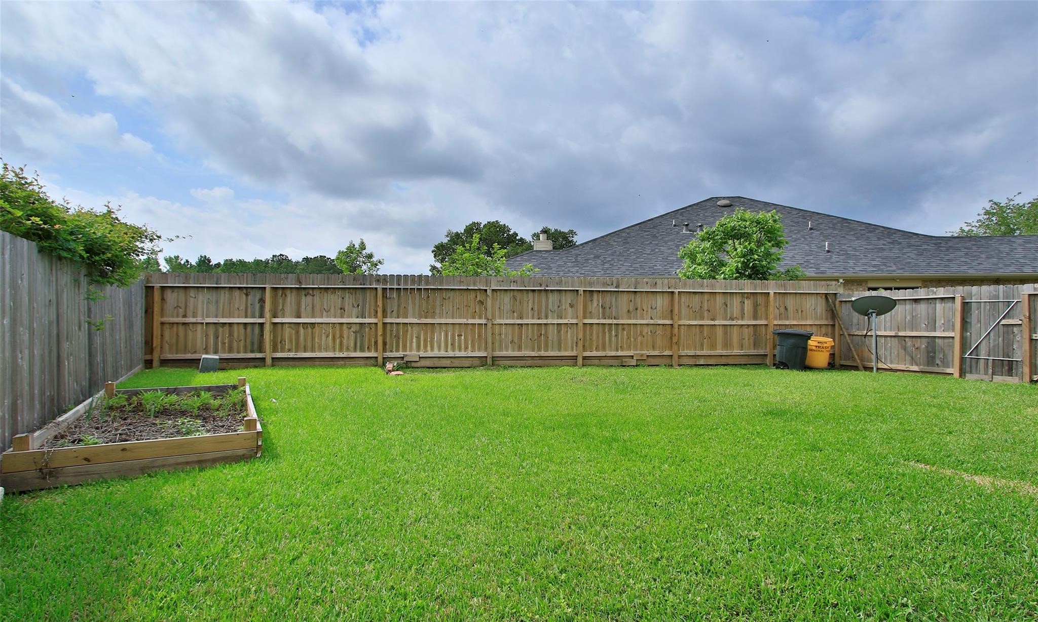 20506 Spring Lilac Lane Spring, TX 77388 - Photo 33 of 33 a view of a garden with a big yard