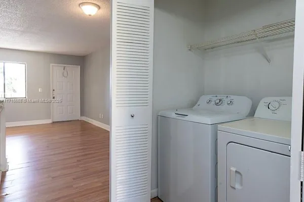 a view of utility room with washer and dryer
