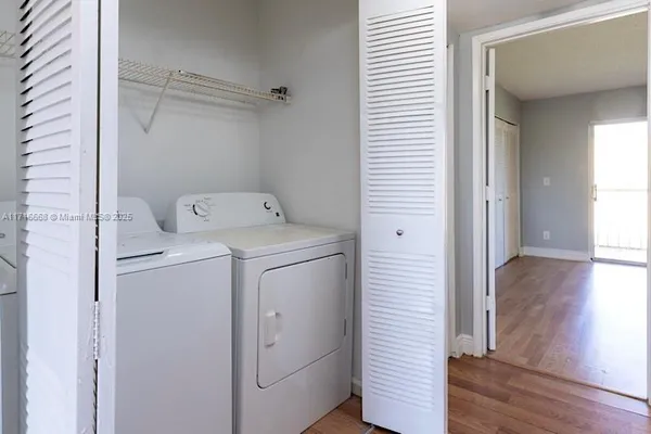a utility room with dryer and washer