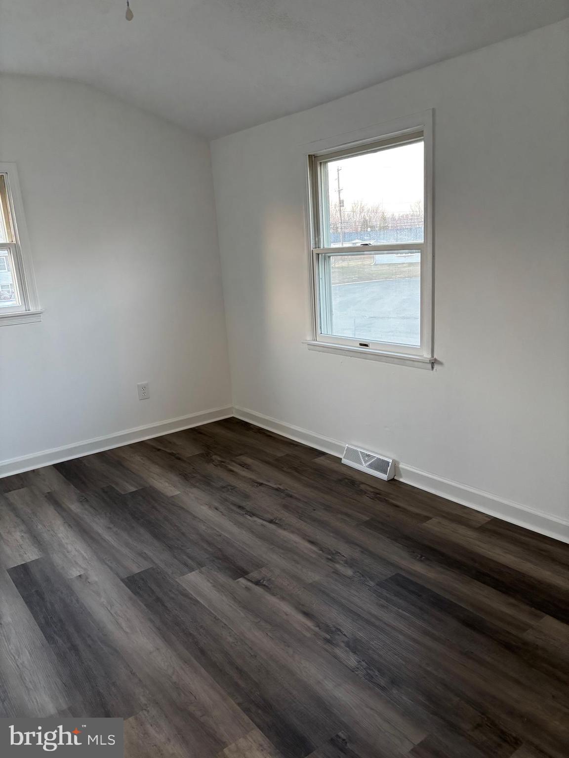 1 Cherry Lane Elkton, MD 21921 - Photo 12 of 12 an empty room with wooden floor and windows