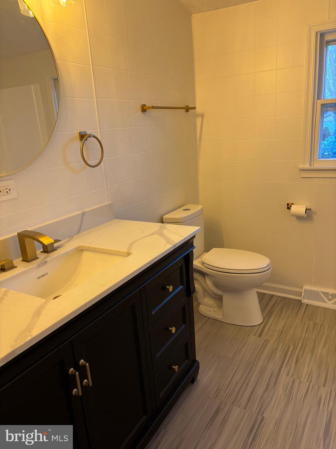 1 Cherry Lane Elkton, MD 21921 - Photo 10 of 12 a bathroom with a sink and a toilet