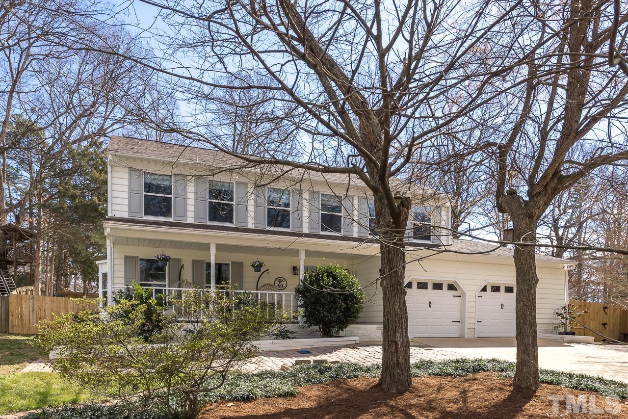 4308 Hickory Ridge Drive Raleigh, NC 27609 - Photo 1 of 46 a front view of a house with a yard