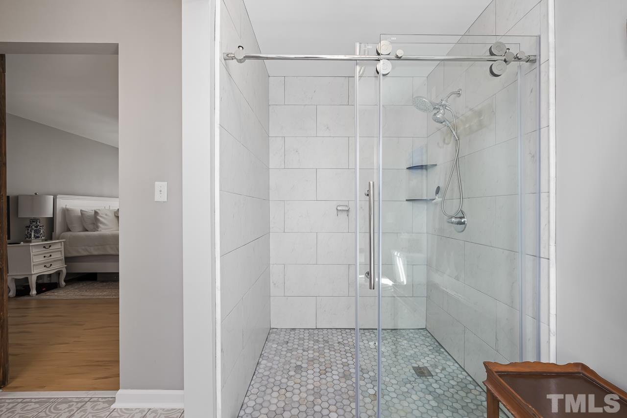4308 Hickory Ridge Drive Raleigh, NC 27609 - Photo 22 of 46 a bathroom with a shower