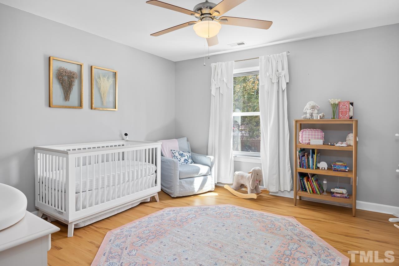 4308 Hickory Ridge Drive Raleigh, NC 27609 - Photo 25 of 46 a bedroom with furniture and a window