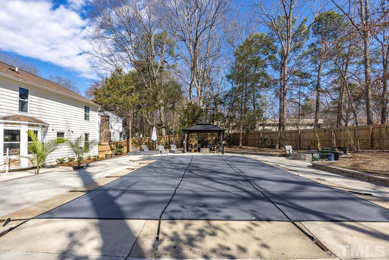 4308 Hickory Ridge Drive Raleigh, NC 27609 - Photo 30 of 46 a view of a building with trees