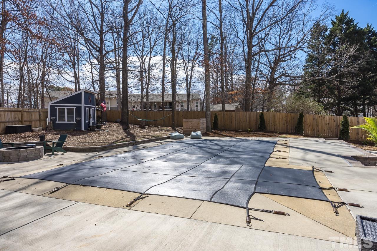 4308 Hickory Ridge Drive Raleigh, NC 27609 - Photo 33 of 46 a view of a backyard with sitting area
