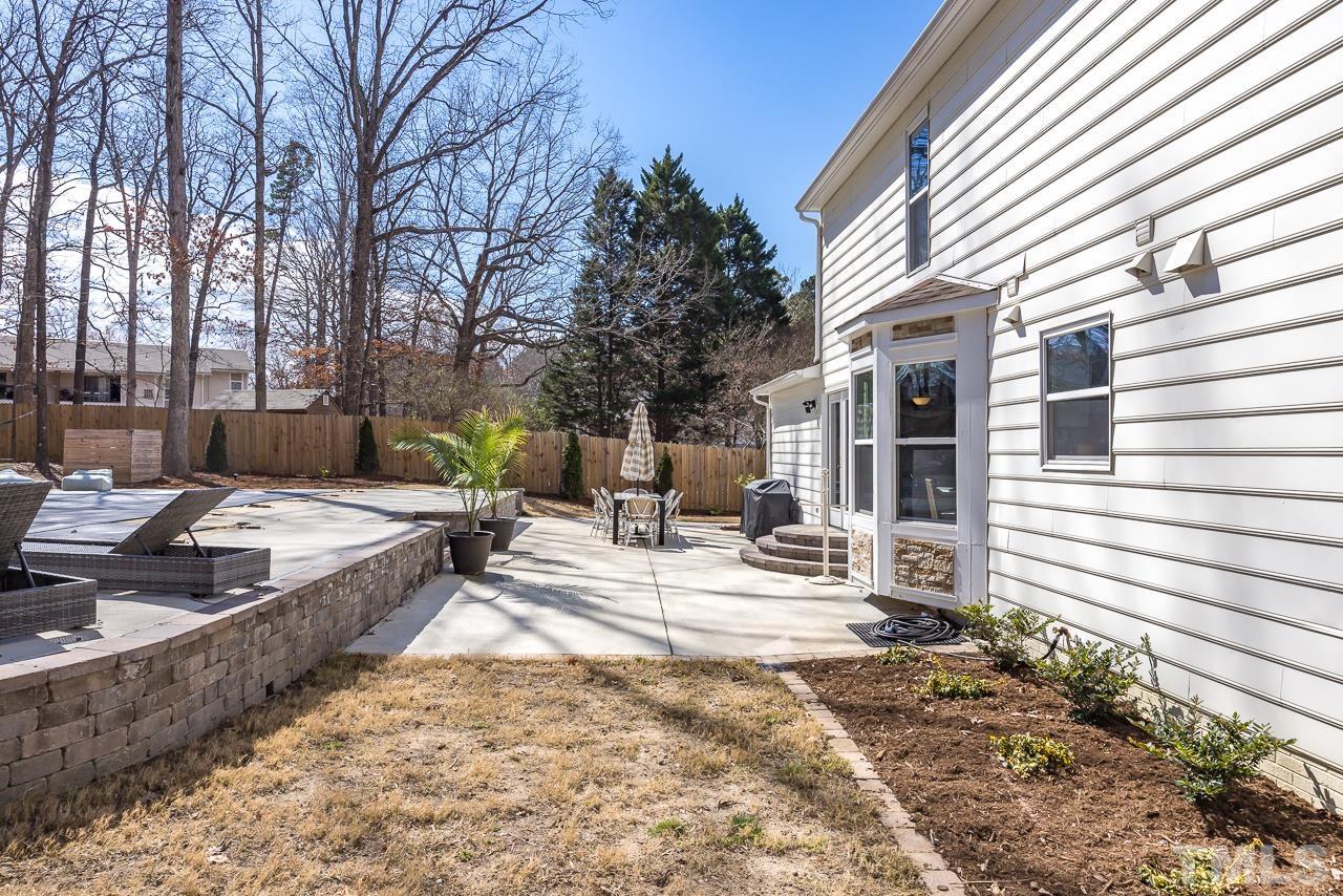 4308 Hickory Ridge Drive Raleigh, NC 27609 - Photo 35 of 46 a view of a backyard with a patio