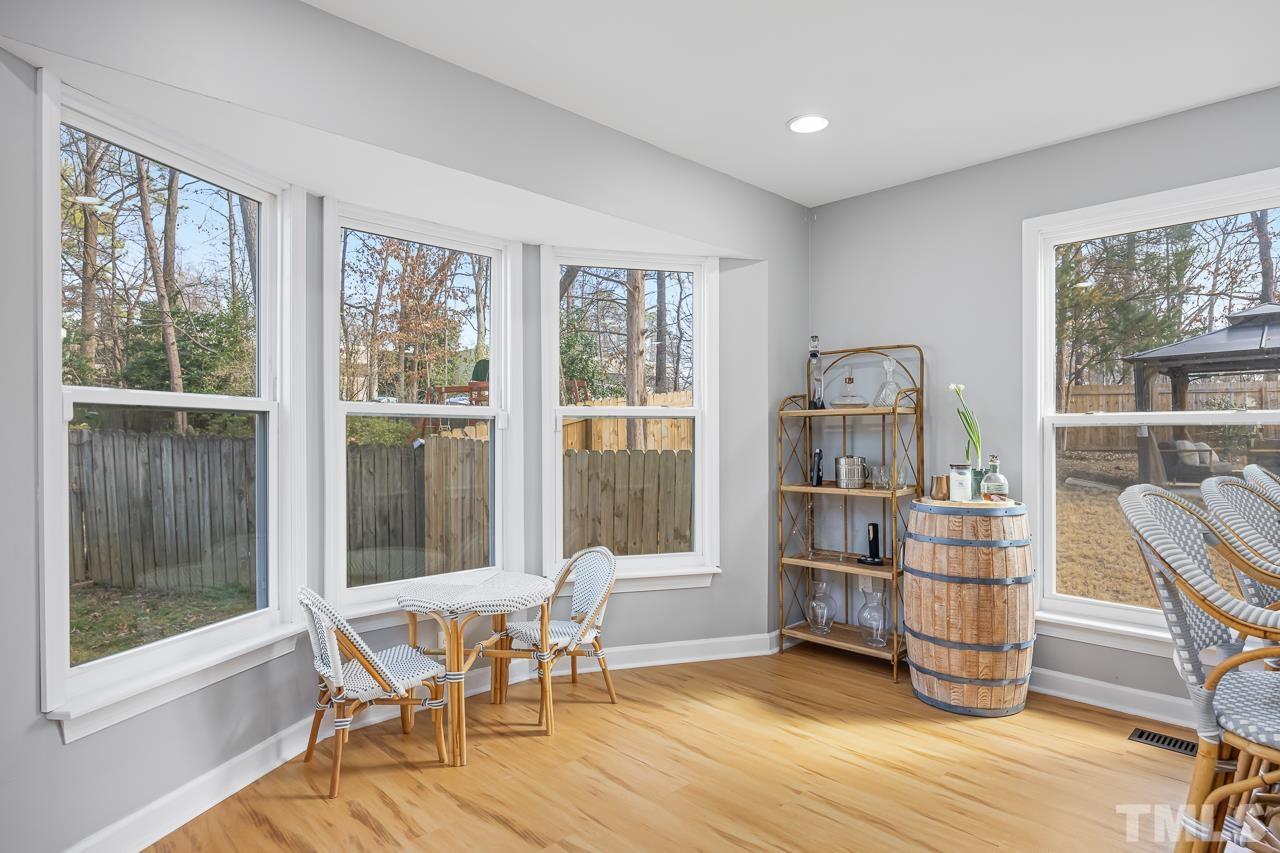 4308 Hickory Ridge Drive Raleigh, NC 27609 - Photo 7 of 46 a view of a workspace with furniture and a window