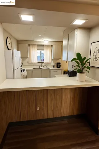 a bathroom with a sink double vanity and a mirror