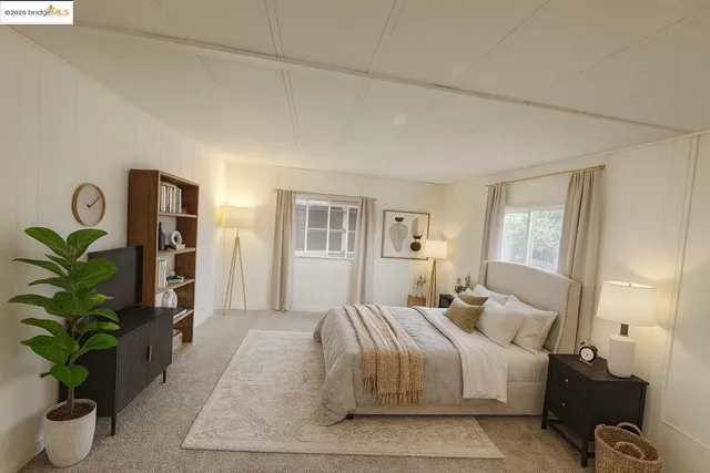 a bedroom with bed and a window