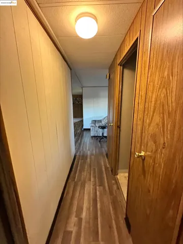 a view of a bathroom with a sink and a mirror