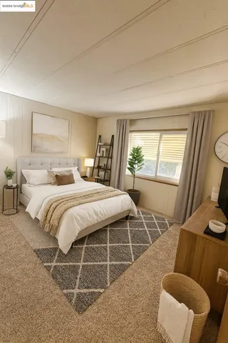 a bedroom with a bed and glass windows