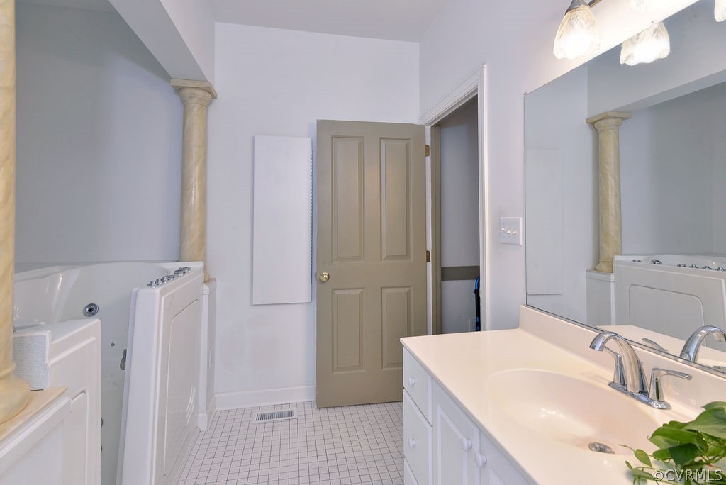 103 Gullane Williamsburg, VA 23188 - Photo 20 of 44 a bathroom with a sink a toilet a tub and shower