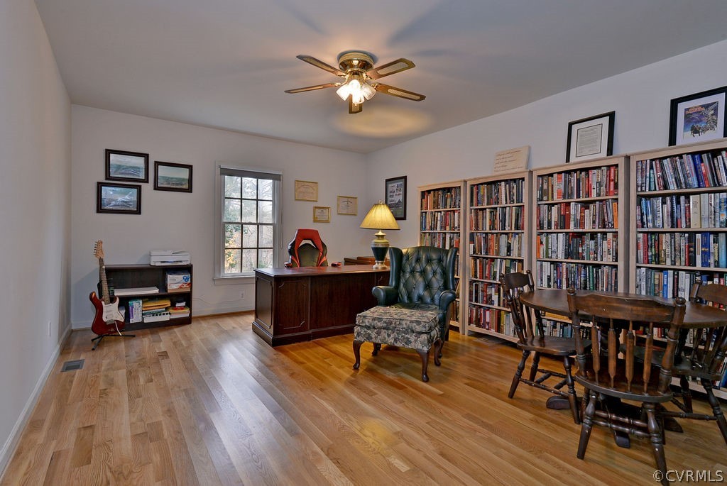 103 Gullane Williamsburg, VA 23188 - Photo 30 of 44 a living room with furniture and a wooden floor