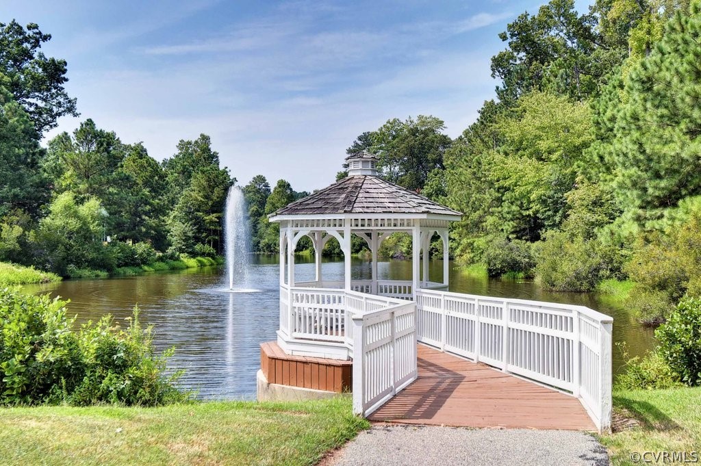 103 Gullane Williamsburg, VA 23188 - Photo 39 of 44 a front view of a house with a garden and lake view